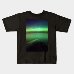 Northern lights glow over lake Kids T-Shirt